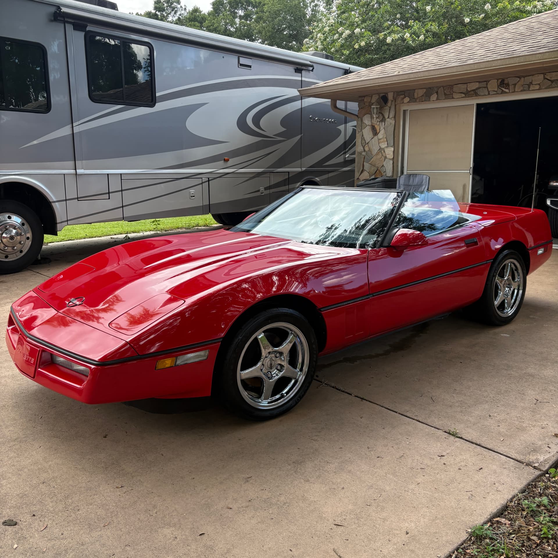 Red Corvette convertible after paint correction